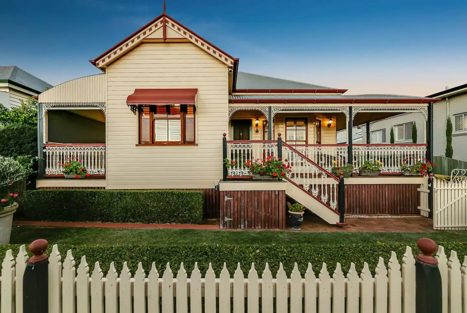 Cottage house front photo with gated lot